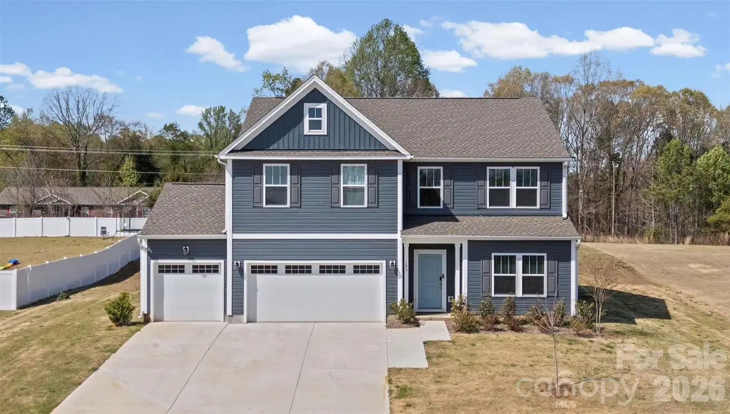 Front exterior of a new home in , Statesville, NC, highlighting curb appeal (Image 1). Front exterior of a new home in , Statesville, NC, highlighting curb appeal (Image 1).