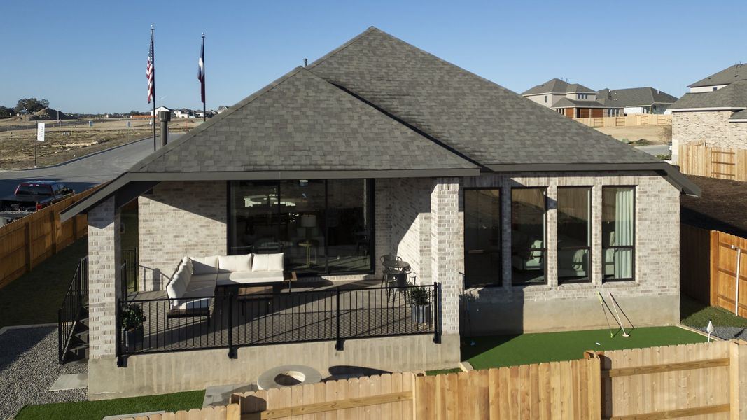 Exterior details and patio area of a home in Lariat 50', Liberty Hill (Image 2).