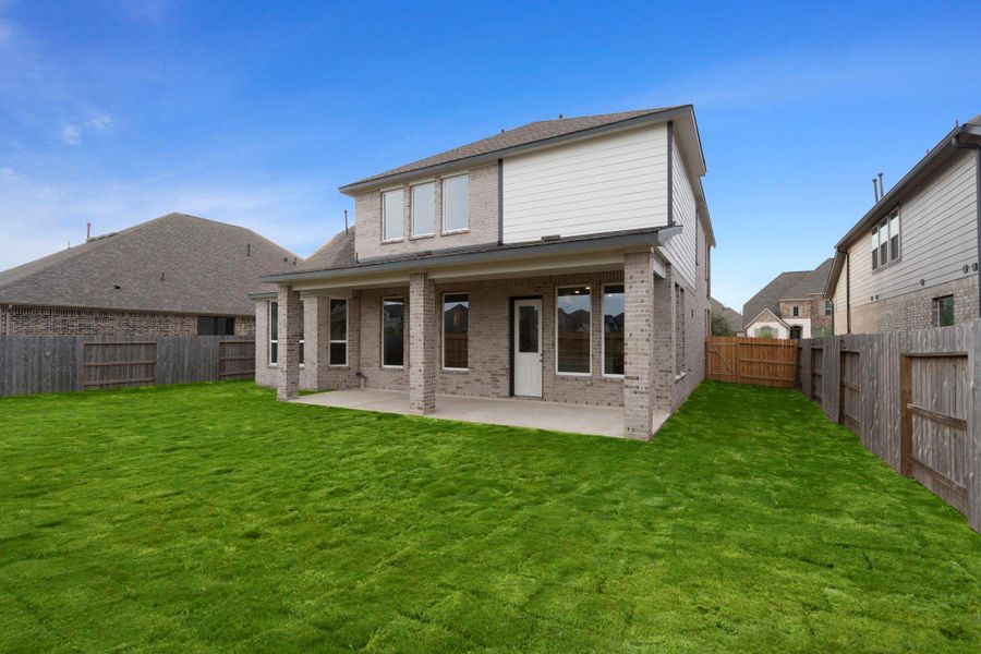 This backyard is perfect for family gatherings, social events, or simply unwinding in the fresh air.
