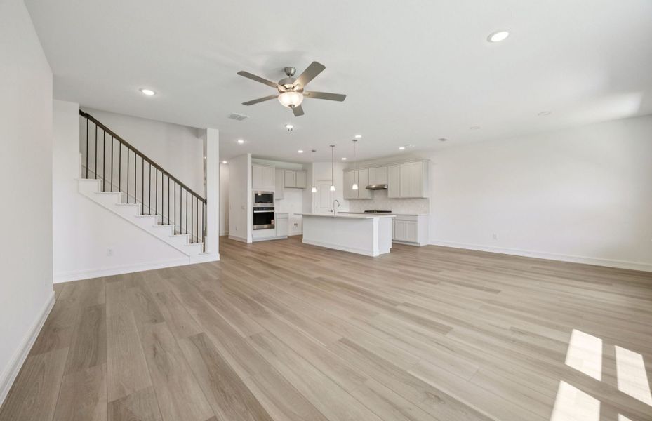 Spacious gathering room  *real home pictured
