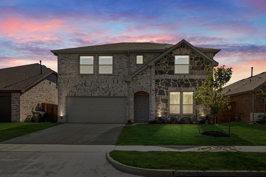 Front exterior of a new home in Rolling Meadows, Lancaster, TX, highlighting curb appeal (Image 1). Front exterior of a new home in Rolling Meadows, Lancaster, TX, highlighting curb appeal (Image 1).