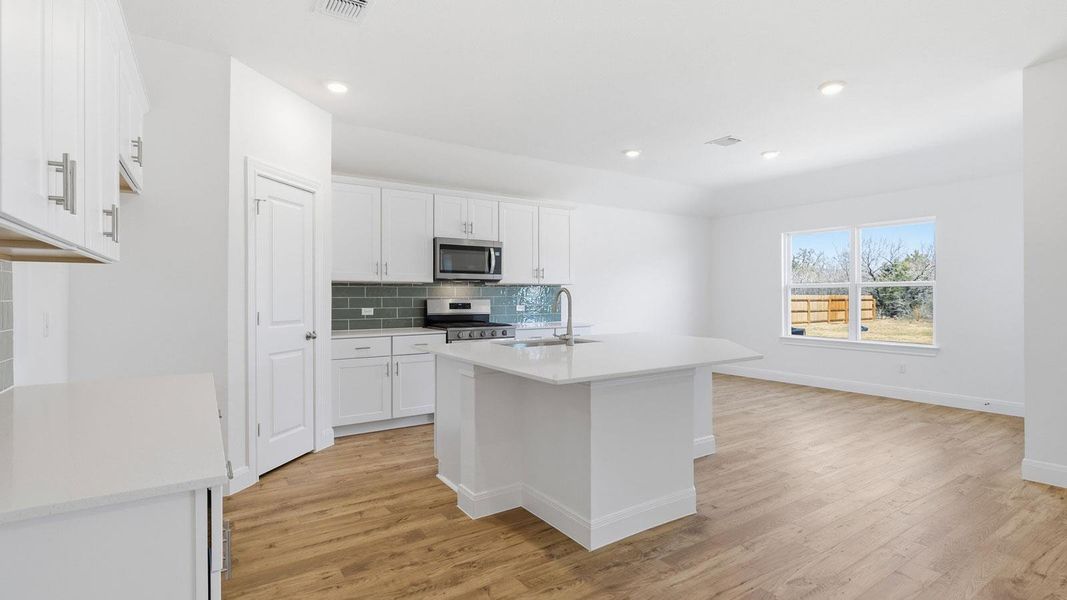 Furnished interior view inside a new home in Railhead, Cedar Creek (Image 4).