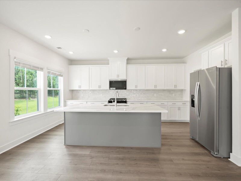 Furnished interior view inside a new home in The Coves at Lakes of Cane Bay, Summerville (Image 10).