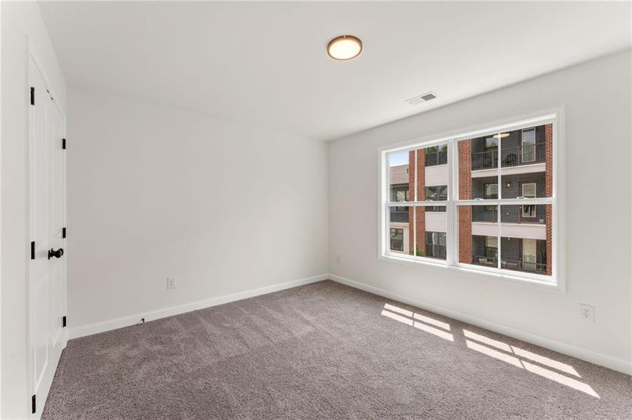 Spacious, unfurnished interior of a new home in Townes at South Main, Kennesaw (Image 26).