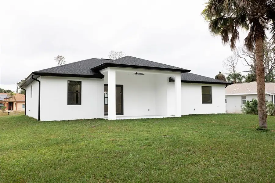 Exterior details and patio area of a home in , North Port (Image 4).