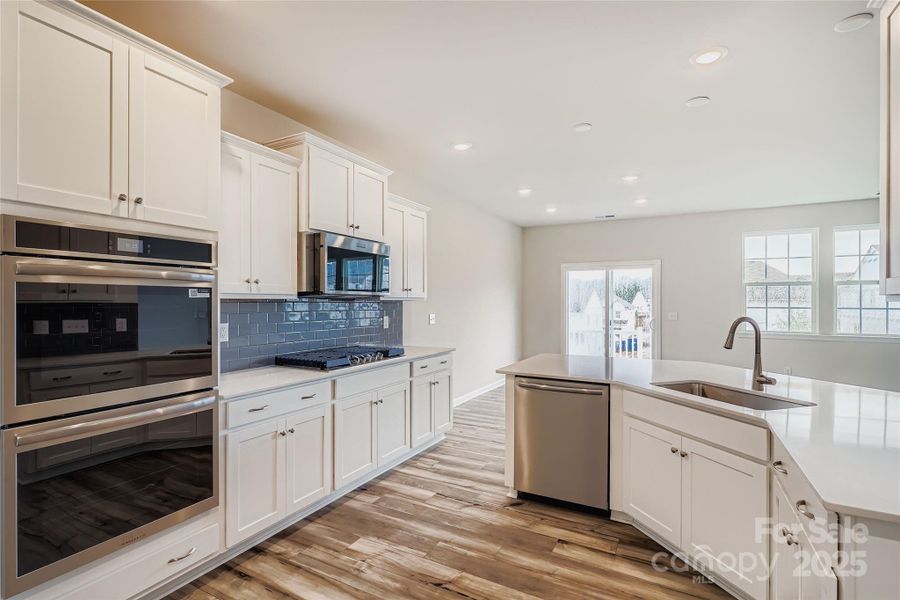 Furnished interior view inside a new home in Shannon Woods: Walk & Enclave, Maiden (Image 4).
