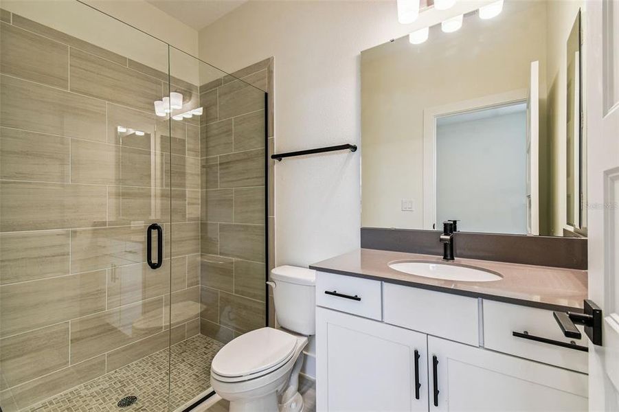Furnished interior view inside a new home in Hidden Ridge, New Port Richey (Image 9).