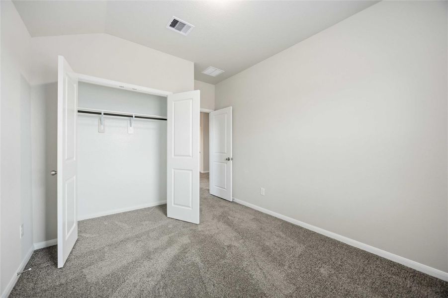Spacious, unfurnished interior of a new home in Sunterra, Katy (Image 28).