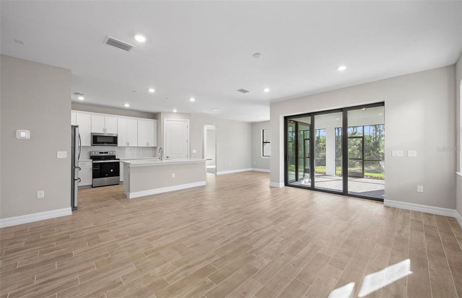 Spacious, unfurnished interior of a new home in Cedar Grove at The Woodlands, North Port (Image 19).