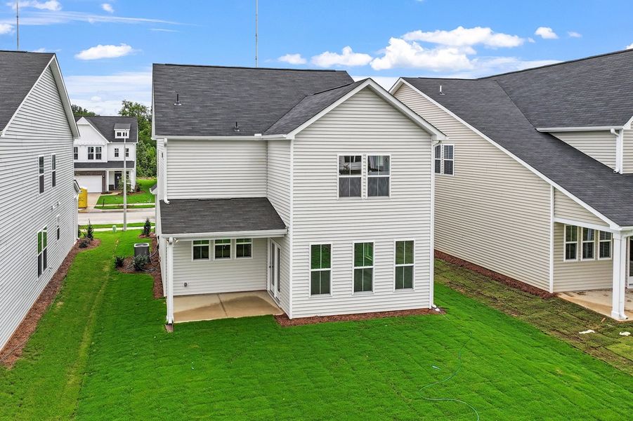 Front exterior of a new home in Renaissance at White Oak, Garner, NC, highlighting curb appeal (Image 19). Front exterior of a new home in Renaissance at White Oak, Garner, NC, highlighting curb appeal (Image 19).