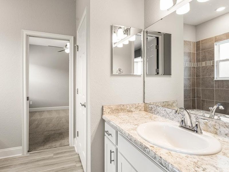 The in-law suite includes a private en-suite bath - Westin II by Highland Homes