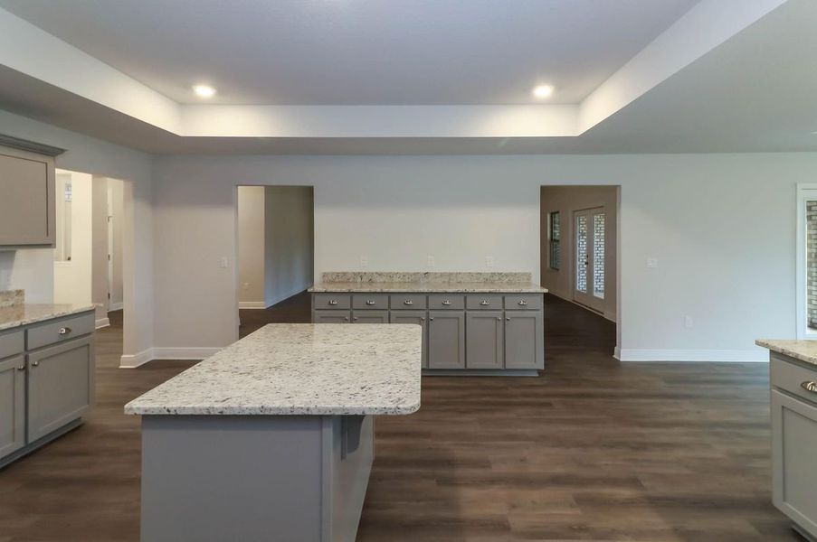 Representative furnished interior of a home built from the Plan 3044 by Adams Homes in Cedar Creek at Deerpoint Lake, Panama City (Image 7).