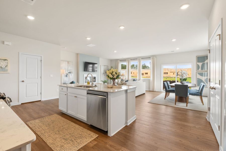 A kitchen with a large island. A kitchen with a large island.