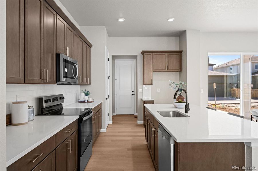 Furnished interior view inside a new home in Painted Prairie, Aurora (Image 14).