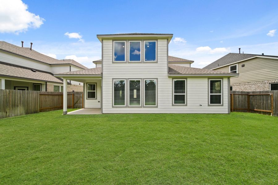 Front exterior of a new home in Grand Oaks – The Cove, Houston, TX, highlighting curb appeal (Image 15).