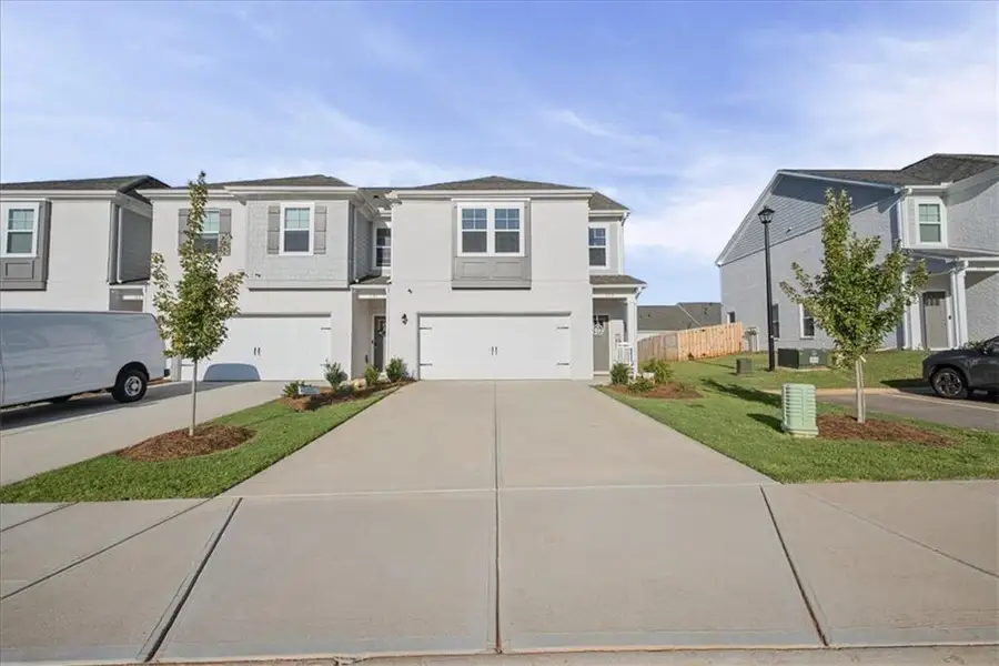 Front exterior of a new home in , McDonough, GA, highlighting curb appeal (Image 24).
