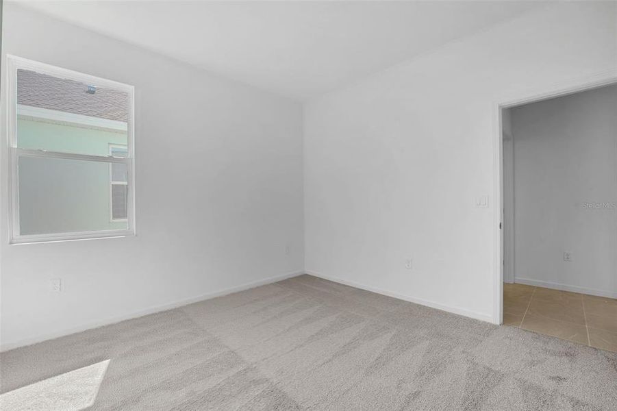 Spacious, unfurnished interior of a new home in Willowbrook North, Winter Haven (Image 37).