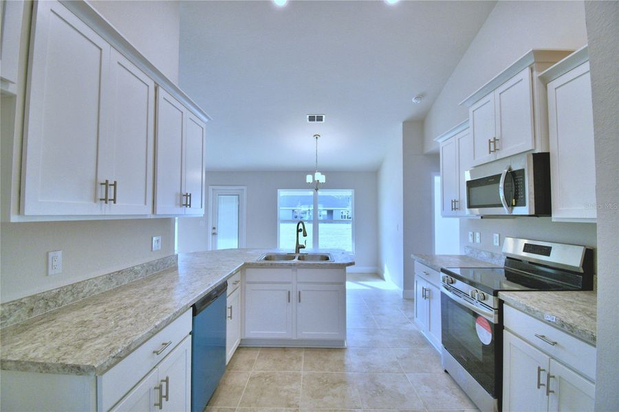 Furnished interior view inside a new home in Cadence Crossing, Auburndale (Image 9).