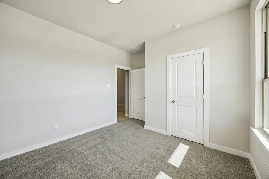 Representative unfurnished interior of a home built from the The Elm by Lillian Custom Homes in Hickory Hill, Sherman (Image 33).