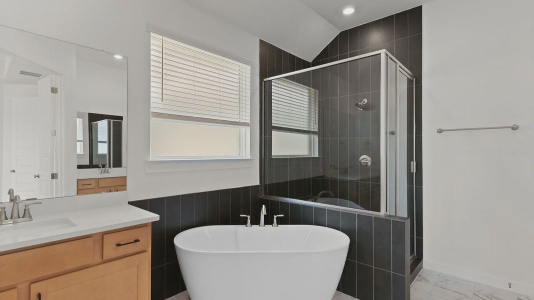 Representative furnished interior of a home built from the Bryson by Chesmar Homes in Newhaven, Manor (Image 7).
