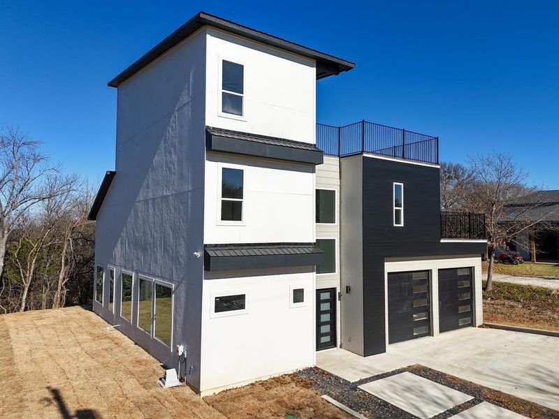 Front exterior of a new home in , Pottsboro, TX, highlighting curb appeal (Image 27).