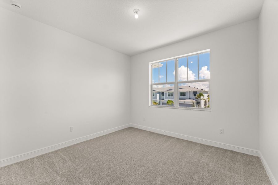 Spacious, unfurnished interior of a new home in Avila, Jensen Beach (Image 11).