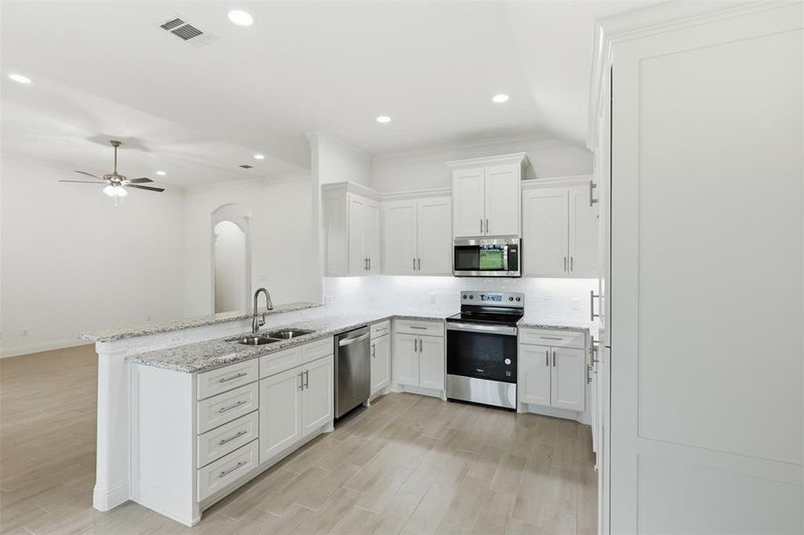 Furnished interior view inside a new home in , Tolar (Image 9).