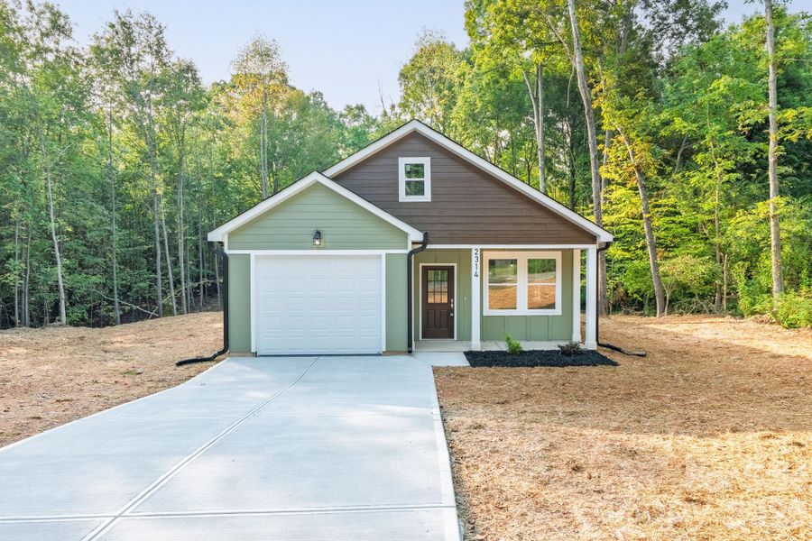 Front exterior of a new home in , Shelby, NC, highlighting curb appeal (Image 1). Front exterior of a new home in , Shelby, NC, highlighting curb appeal (Image 1).
