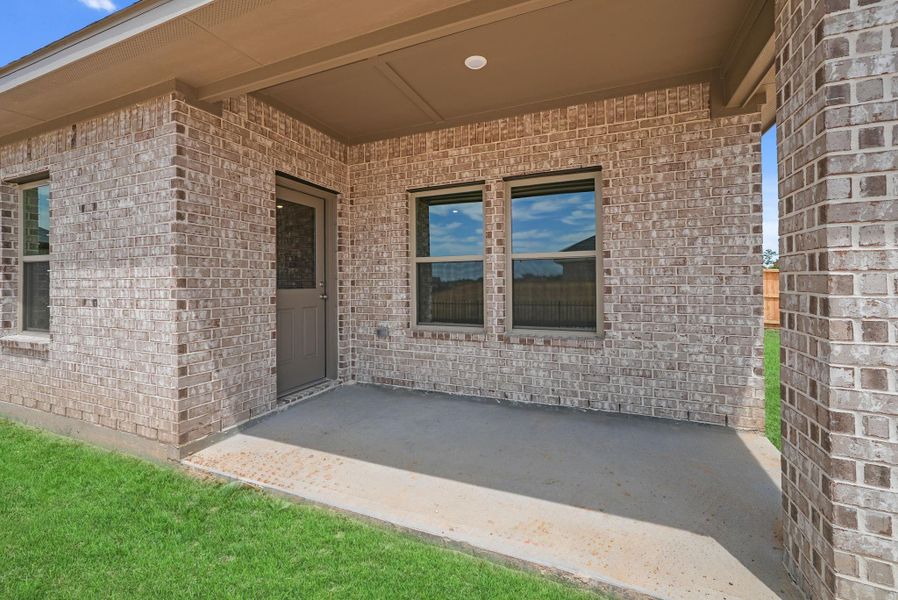 Exterior details and patio area of a home in Laurel Landing, Alvin (Image 20). Exterior details and patio area of a home in Laurel Landing, Alvin (Image 20).