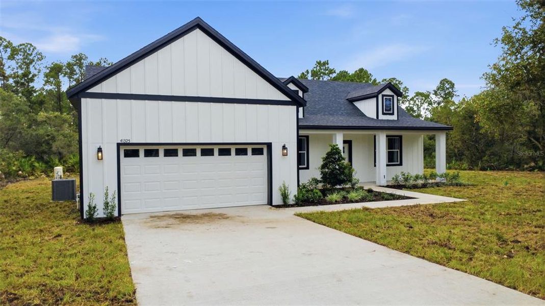 Front exterior of a new home in , Eustis, FL, highlighting curb appeal (Image 22).