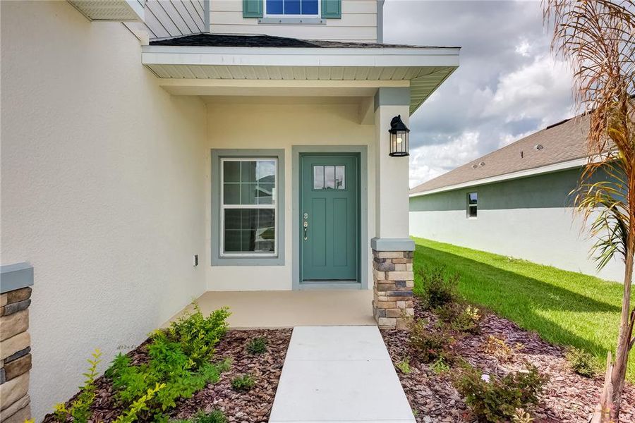 Exterior details and patio area of a home in Aviary at Rutland Ranch, Parrish (Image 3).