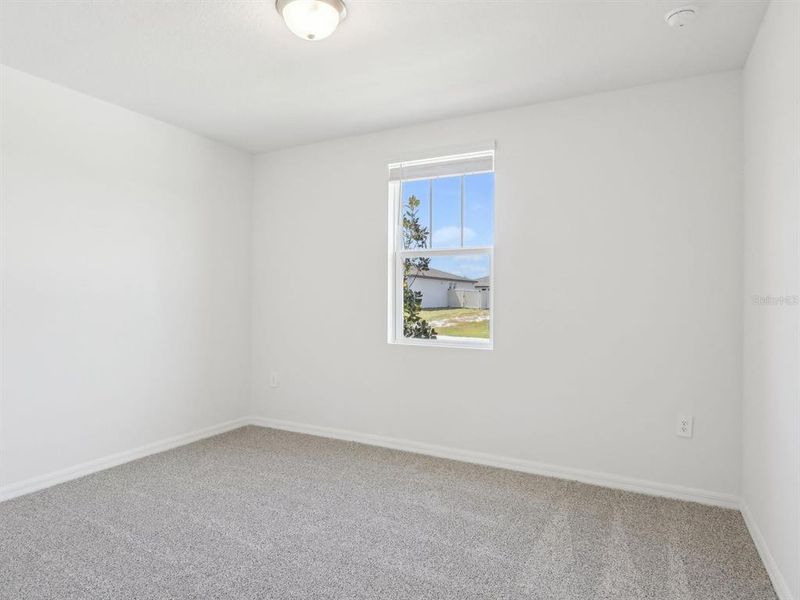 Spacious, unfurnished interior of a new home in The Reserve at Van Oaks, Auburndale (Image 29).