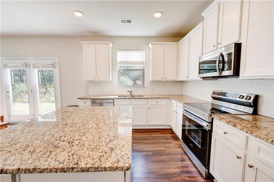 Furnished interior view inside a new home in , Calhoun (Image 33).