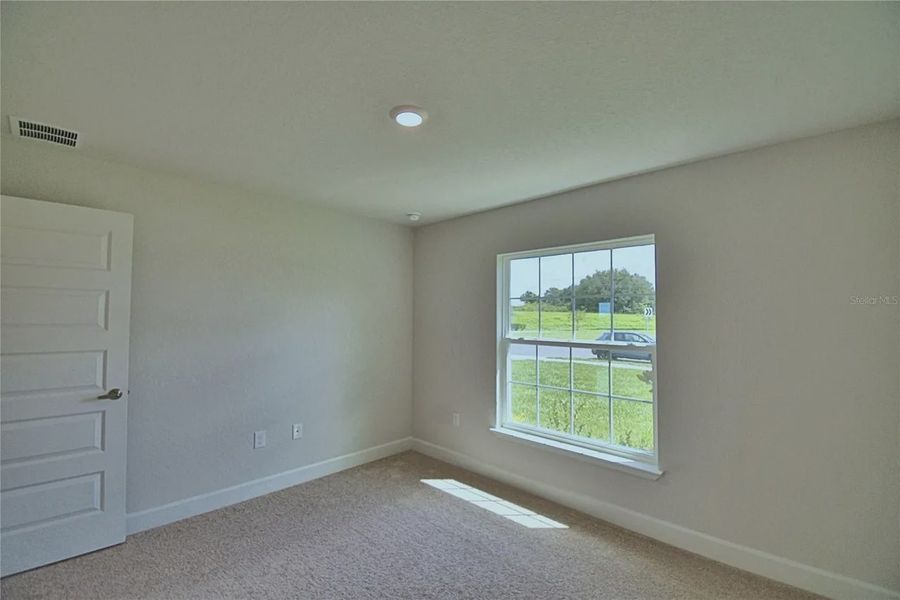 Spacious, unfurnished interior of a new home in Cadence Crossing, Auburndale (Image 28).