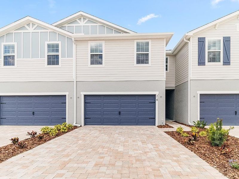 This spacious two-story townhome includes a 2-car garage and paver driveway. This spacious two-story townhome includes a 2-car garage and paver driveway.