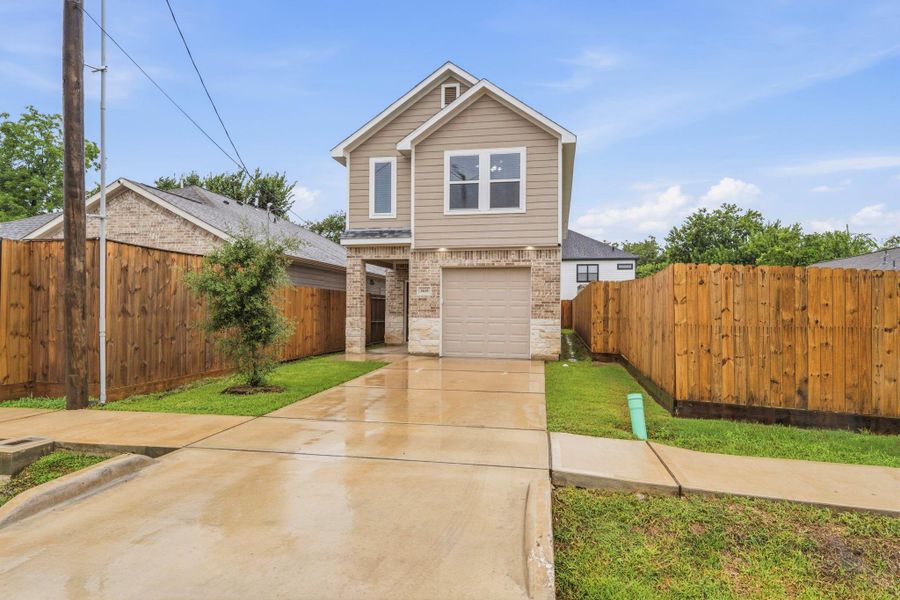 Long driveway provides additional off street parking.