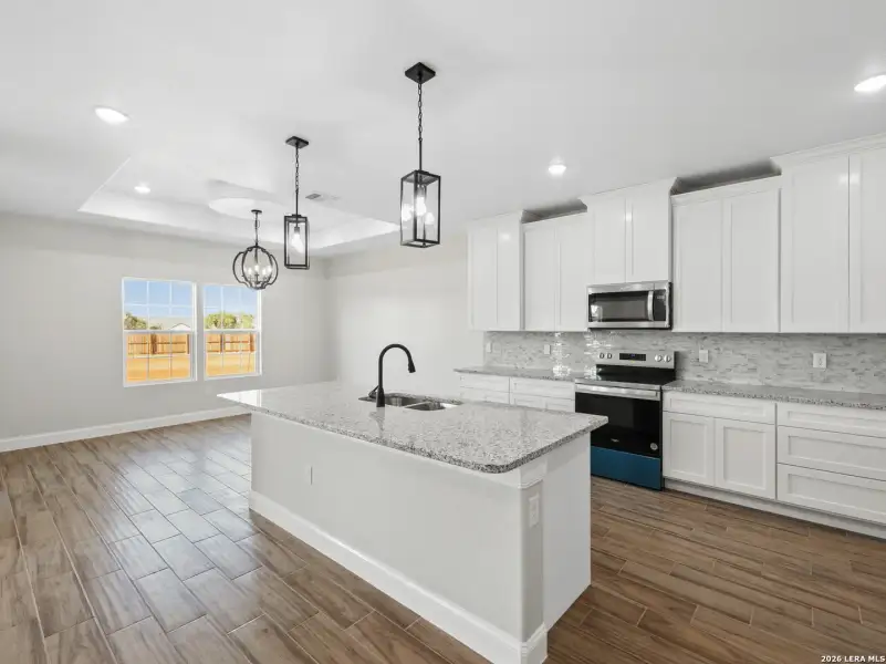 Furnished interior view inside a new home in , San Antonio (Image 7).