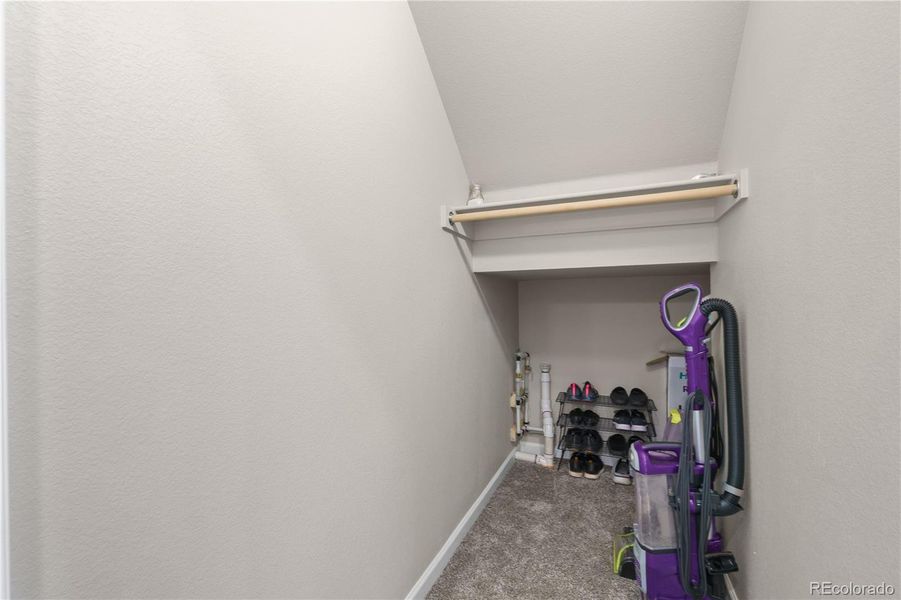 Under stair Coat/Storage closet off garage entrance