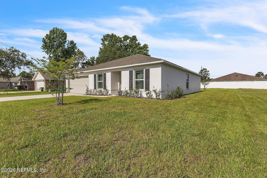 Exterior details and patio area of a home in Palm Coast, Palm Coast (Image 24).
