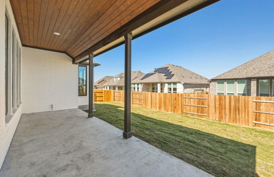 Exterior details and patio area of a home in 6 Creeks, Kyle (Image 24).