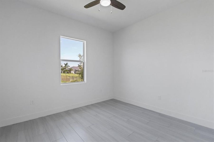 Spacious, unfurnished interior of a new home in , Port Charlotte (Image 12).
