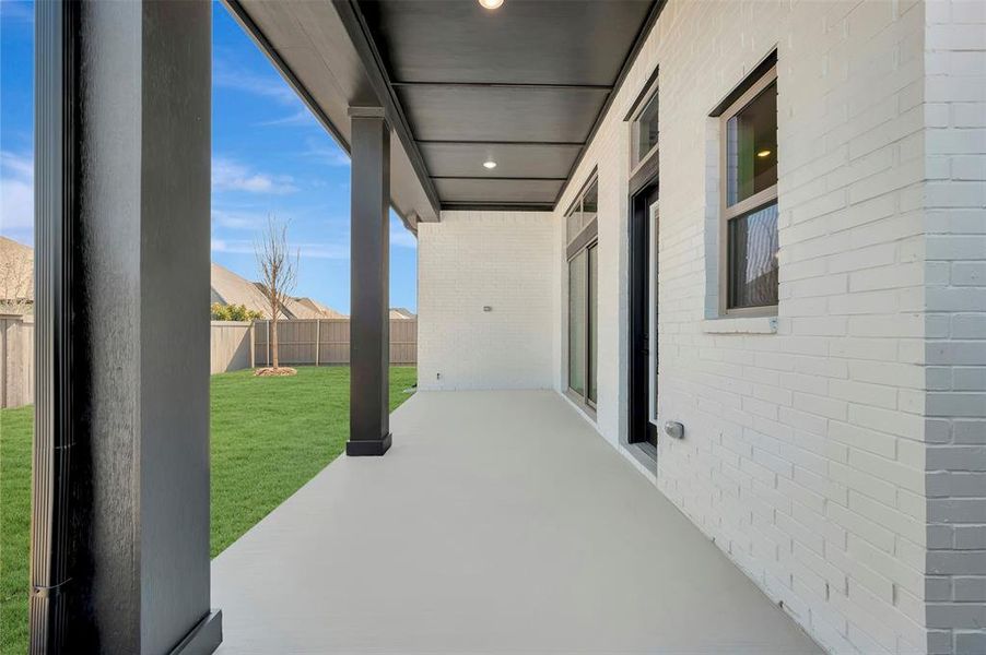 Fenced backyard with a patio Fenced backyard with a patio