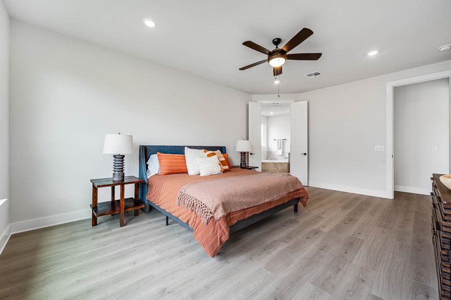 Furnished interior view inside a new home in 6 Creeks, Kyle (Image 11).