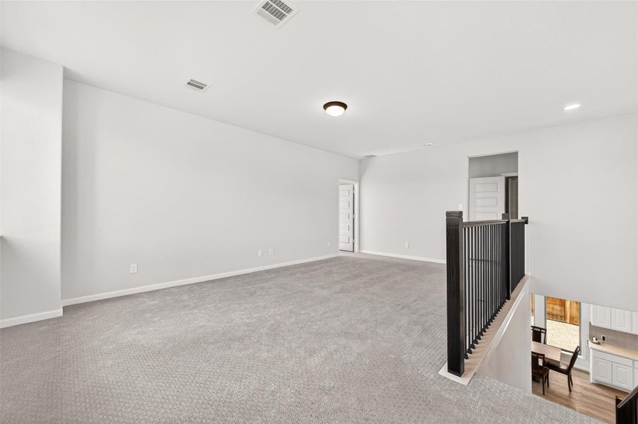 Spacious, unfurnished interior of a new home in Cane Island, Katy (Image 35).