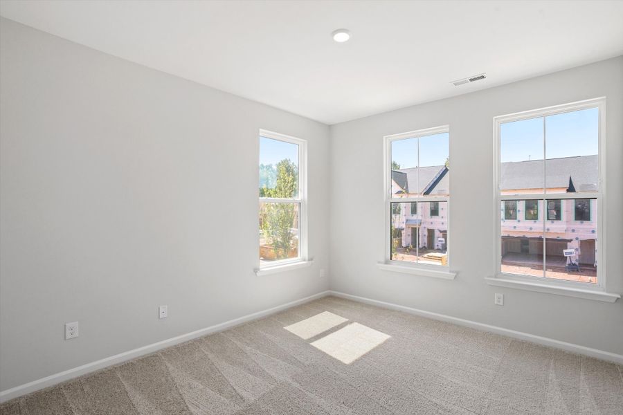 Spacious, unfurnished interior of a new home in Sweetbrier, Durham (Image 27).