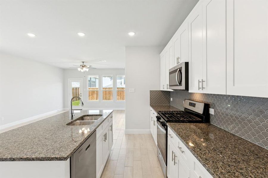 Furnished interior view inside a new home in Venetian, Weston (Image 10).