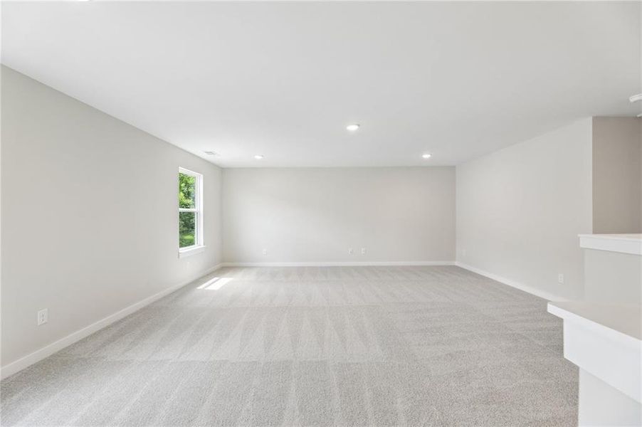 Spacious, unfurnished interior of a new home in The Park at Brighton, Locust Grove (Image 23).