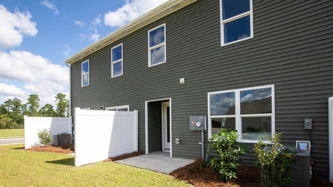 Exterior details and patio area of a home in The Willows at Blake Farm, Wilmington (Image 3).