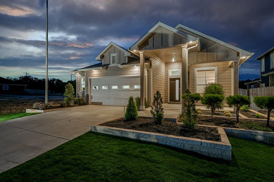 Front exterior of a new home in Meyer Ranch, New Braunfels, TX, highlighting curb appeal (Image 23).
