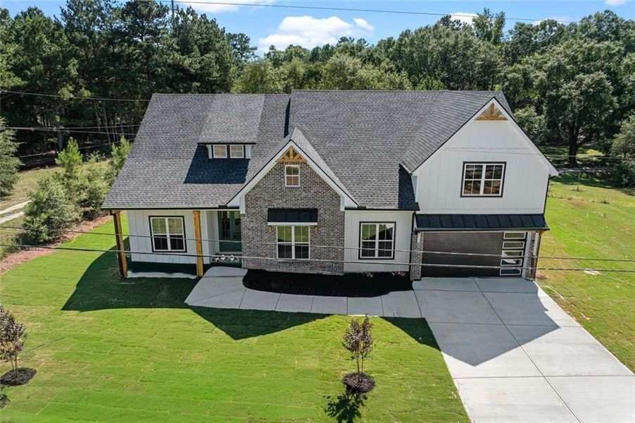 Front exterior of a new home in , Powder Springs, GA, highlighting curb appeal (Image 33).